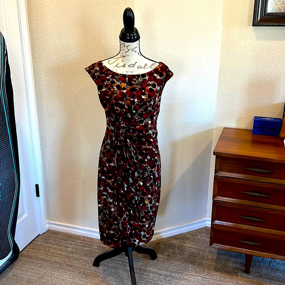 Red, grey, black and mustard spotted dress. Size 10. Sleeveless.